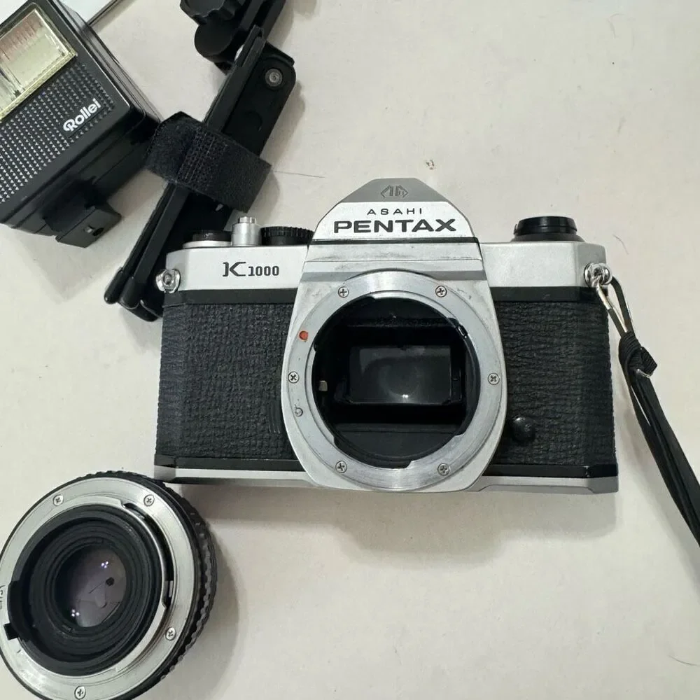 Pentax K1000 35mm SLR Camera w/SMC Pentax-M 50mm f/1.2 Lens, flash & mini tripod